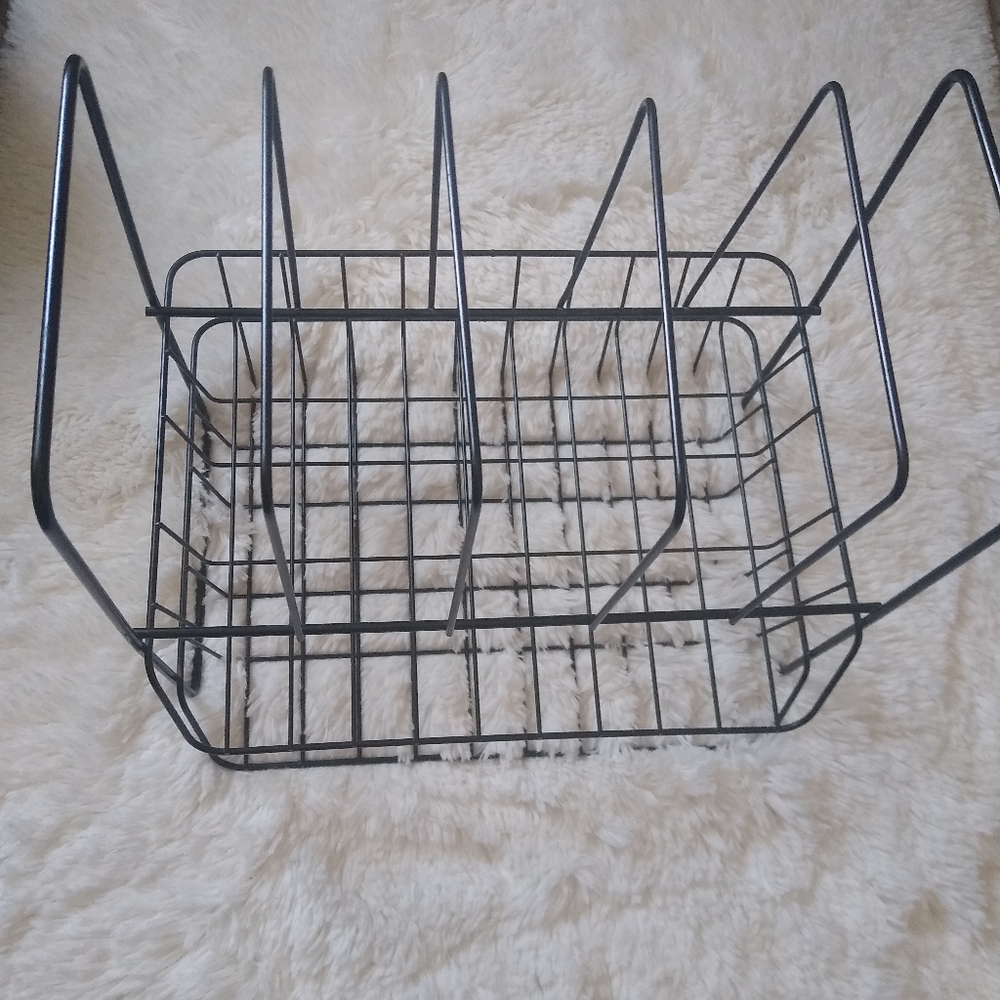 Black metal book organizer.
